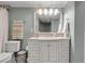 Bathroom features a vanity with marble countertop and a shower/tub combo at 4119 61St Avenue W Ter # 105, Bradenton, FL 34210