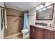 Bathroom with shower, toilet, and vanity with granite countertop at 4119 61St Avenue W Ter # 105, Bradenton, FL 34210