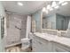 Bathroom with walk-in shower, toilet, and vanity with marble countertop at 4119 61St Avenue W Ter # 105, Bradenton, FL 34210
