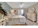 Serene bedroom with king-size bed, neutral tones, and ample closet space at 4119 61St Avenue W Ter # 105, Bradenton, FL 34210