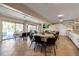 Community room with tables, chairs, and pool view at 4119 61St Avenue W Ter # 105, Bradenton, FL 34210