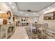 Coastal-themed dining area with table and chairs, adjacent to kitchen at 4119 61St Avenue W Ter # 105, Bradenton, FL 34210