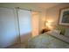 Bedroom showcases barn door and closet space at 4234 Gulf Of Mexico Dr # Y2, Longboat Key, FL 34228