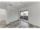 Bedroom with large closet and sliding door to balcony at 4477 Sandner Dr, Sarasota, FL 34243