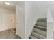 Clean entryway with wood-look floors and staircase at 4477 Sandner Dr, Sarasota, FL 34243