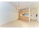 Dining area with light wood cabinets and a view into kitchen at 4507 Park Lake N Ter # 4507, Bradenton, FL 34209