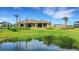 House with a large backyard and pond view at 4672 Mondrian Ct, Sarasota, FL 34240