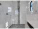 Spa-like shower with marble tile and mosaic accents at 4672 Mondrian Ct, Sarasota, FL 34240