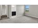 Bright bedroom with grey carpet, large window, and ensuite bathroom access at 4672 Mondrian Ct, Sarasota, FL 34240