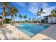 Inviting pool with ample lounge chairs for sunbathing at 4672 Mondrian Ct, Sarasota, FL 34240