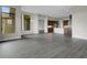 Open concept dining room with hardwood floors and views of the backyard at 4672 Mondrian Ct, Sarasota, FL 34240