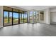 Open concept dining area with stunning views and hardwood floors at 4672 Mondrian Ct, Sarasota, FL 34240