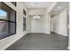 Spacious dining room featuring wood-look floors and a chandelier at 4672 Mondrian Ct, Sarasota, FL 34240
