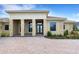 Front entry with double doors and stone columns at 4672 Mondrian Ct, Sarasota, FL 34240