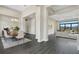 Open floor plan with hardwood floors and access to backyard at 4672 Mondrian Ct, Sarasota, FL 34240