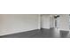 Spacious living area with wood-look floors and access to entryway at 4672 Mondrian Ct, Sarasota, FL 34240