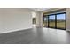 Bright living room with sliding glass doors to patio at 4672 Mondrian Ct, Sarasota, FL 34240