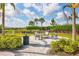 Community fire pit area with comfortable seating, perfect for social gatherings and relaxing evenings at 4705 Tortona Ct, Bradenton, FL 34211