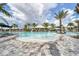 Community resort-style pool with lounge chairs and a swim-up bar at 4705 Tortona Ct, Bradenton, FL 34211