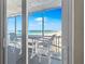 Stunning ocean view from private balcony, featuring outdoor seating at 6300 Midnight Pass Rd # 606, Sarasota, FL 34242