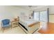 Cozy bedroom with a comfortable bed and chair at 7135 27Th W Ave # 7135, Bradenton, FL 34209