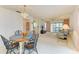Open dining area with view into living room at 7135 27Th W Ave # 7135, Bradenton, FL 34209