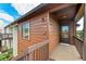 Exterior view of condo building showcasing wood siding and private entrance at 7135 27Th W Ave # 7135, Bradenton, FL 34209