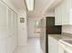 View of kitchen, showing appliances and ample storage at 7135 27Th W Ave # 7135, Bradenton, FL 34209