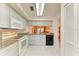 Efficient kitchen, granite counters, white cabinets at 7135 27Th W Ave # 7135, Bradenton, FL 34209