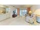 Open living area with wet bar and patio access at 7135 27Th W Ave # 7135, Bradenton, FL 34209