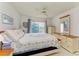 Bright main bedroom with ceiling fan and large bed at 7135 27Th W Ave # 7135, Bradenton, FL 34209