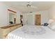 Spacious main bedroom with dresser and ensuite bathroom at 7135 27Th W Ave # 7135, Bradenton, FL 34209