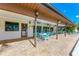 Covered patio with tables and chairs at 7135 27Th W Ave # 7135, Bradenton, FL 34209