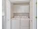 Convenient in-unit laundry with washer and dryer and cabinets at 7335 Fountain Palm Cir # 7335, Bradenton, FL 34203