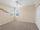 Bedroom featuring a ceiling fan and neutral decor at 8133 Miramar Way # 201, Lakewood Ranch, FL 34202