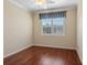 Bedroom with hardwood floors and a ceiling fan at 8133 Miramar Way # 201, Lakewood Ranch, FL 34202