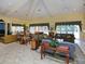 Spacious community room with comfortable seating and high ceilings at 8133 Miramar Way # 201, Lakewood Ranch, FL 34202