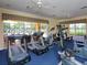 Fitness center with various exercise equipment and pool view at 8133 Miramar Way # 201, Lakewood Ranch, FL 34202