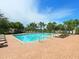Inviting community pool with plenty of lounge chairs at 8133 Miramar Way # 201, Lakewood Ranch, FL 34202