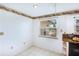 Kitchen breakfast nook with tile flooring and window view at 104 Leland Se St, Port Charlotte, FL 33952