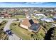 Aerial view of a waterfront property showcasing its location and neighborhood at 118 Creek Se Dr, Port Charlotte, FL 33952
