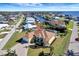 Aerial view showcasing a waterfront home's desirable location at 118 Creek Se Dr, Port Charlotte, FL 33952