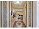 Open entryway leading into a spacious living area with hardwood floors at 118 Creek Se Dr, Port Charlotte, FL 33952