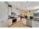 Modern kitchen with stainless steel appliances and white cabinetry at 118 Creek Se Dr, Port Charlotte, FL 33952