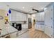 Well-equipped kitchen with white cabinets, granite counters, and stainless steel appliances at 118 Creek Se Dr, Port Charlotte, FL 33952