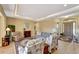 Relaxing living room with comfortable seating, a view of the pool and lanai at 118 Creek Se Dr, Port Charlotte, FL 33952