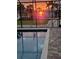 Enjoy stunning sunset views from this screened pool area at 118 Creek Se Dr, Port Charlotte, FL 33952