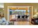 View of a relaxing pool area with patio furniture from inside the house at 118 Creek Se Dr, Port Charlotte, FL 33952