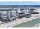 Aerial view of beachfront property with multiple buildings at 1800 Benjamin Franklin Dr # A304, Sarasota, FL 34236