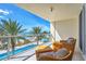 Relaxing balcony with ocean and pool view at 1800 Benjamin Franklin Dr # A304, Sarasota, FL 34236